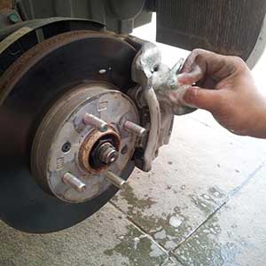cleaning the brake calipers